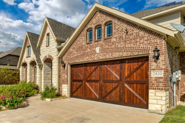 Newly stained cedar garage door