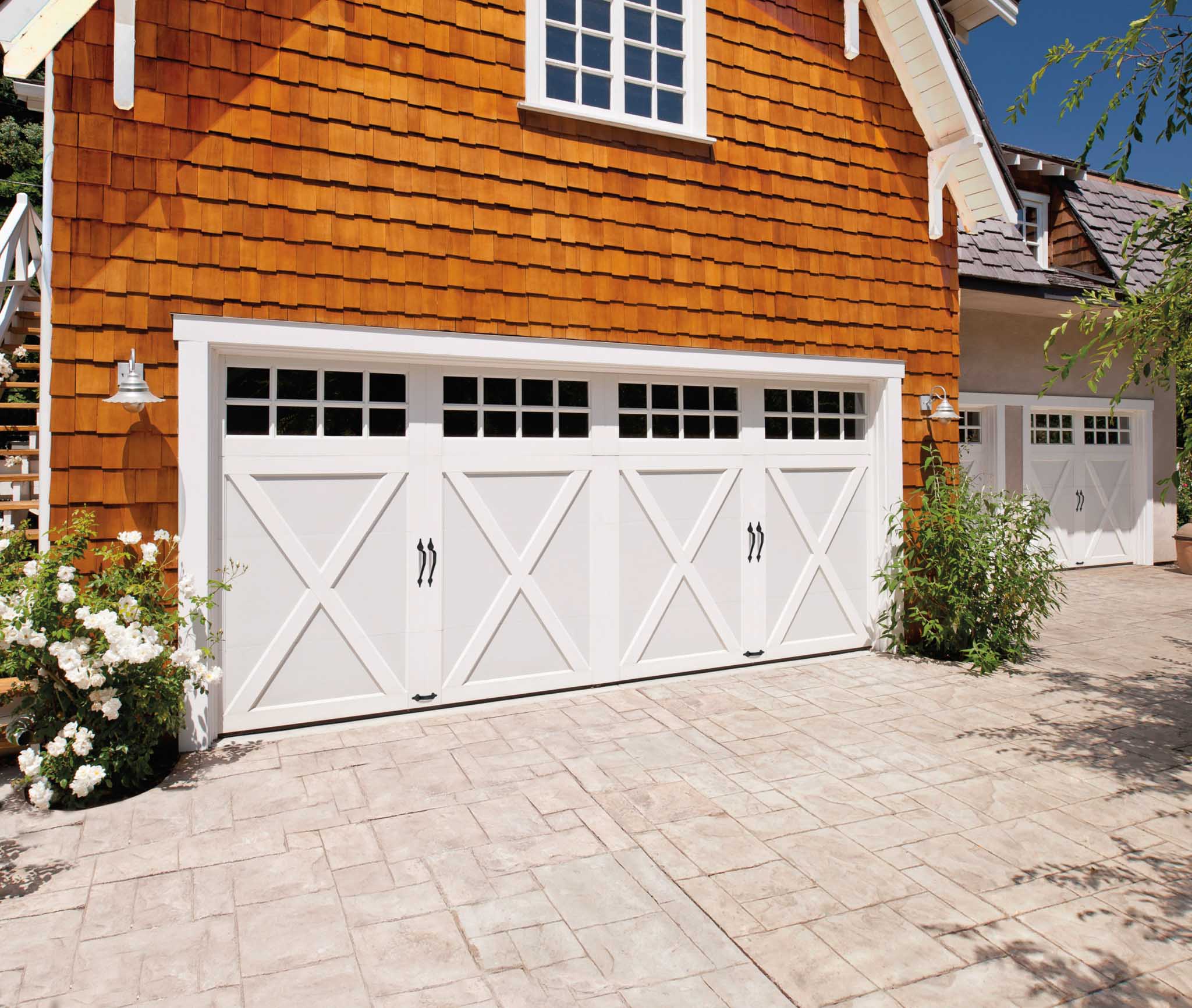 16 x 8 composite trim garage door with a smooth finish