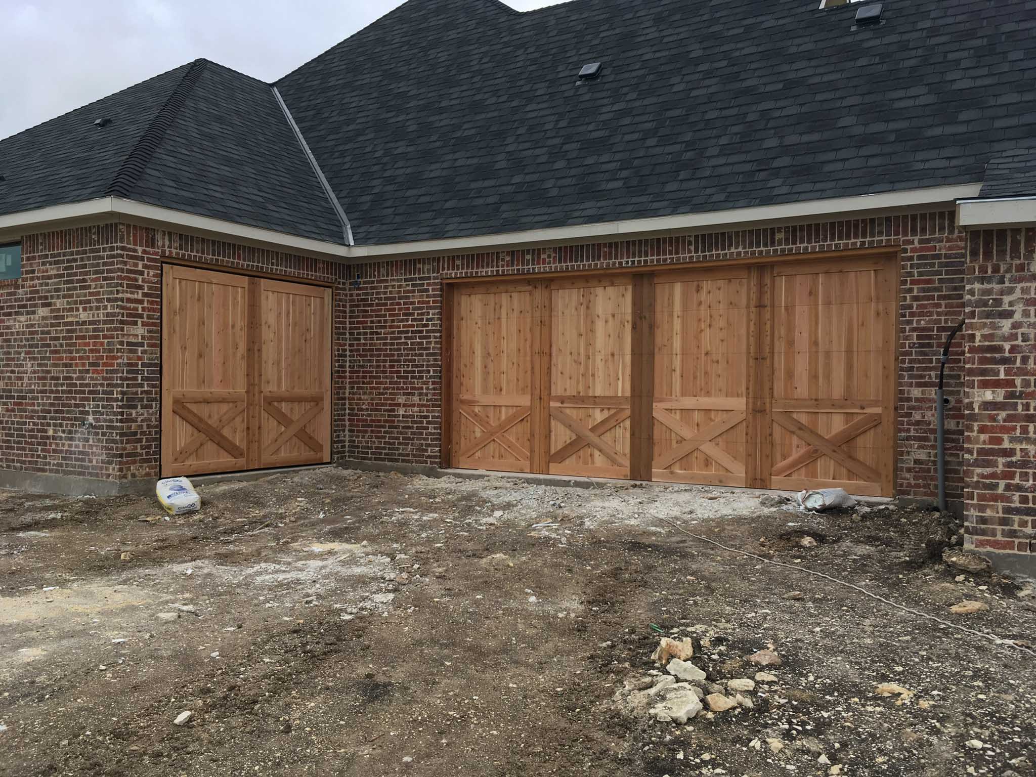 16x8 and 8x8 cedar garage doors with x panels