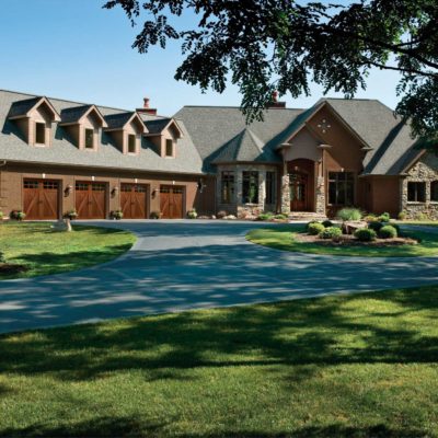 carriage house wood garage doors with glass