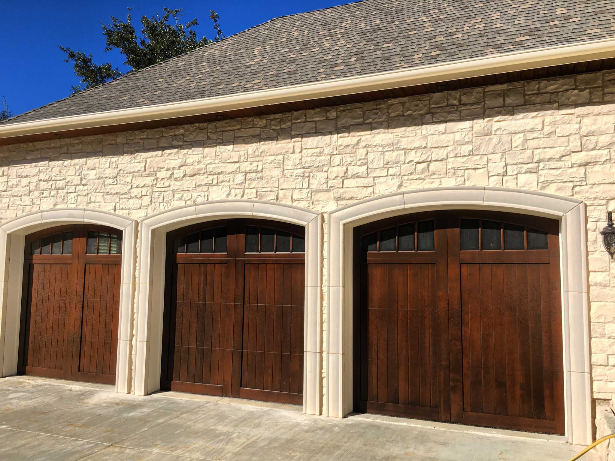 clear cedar arched vertical light garage door