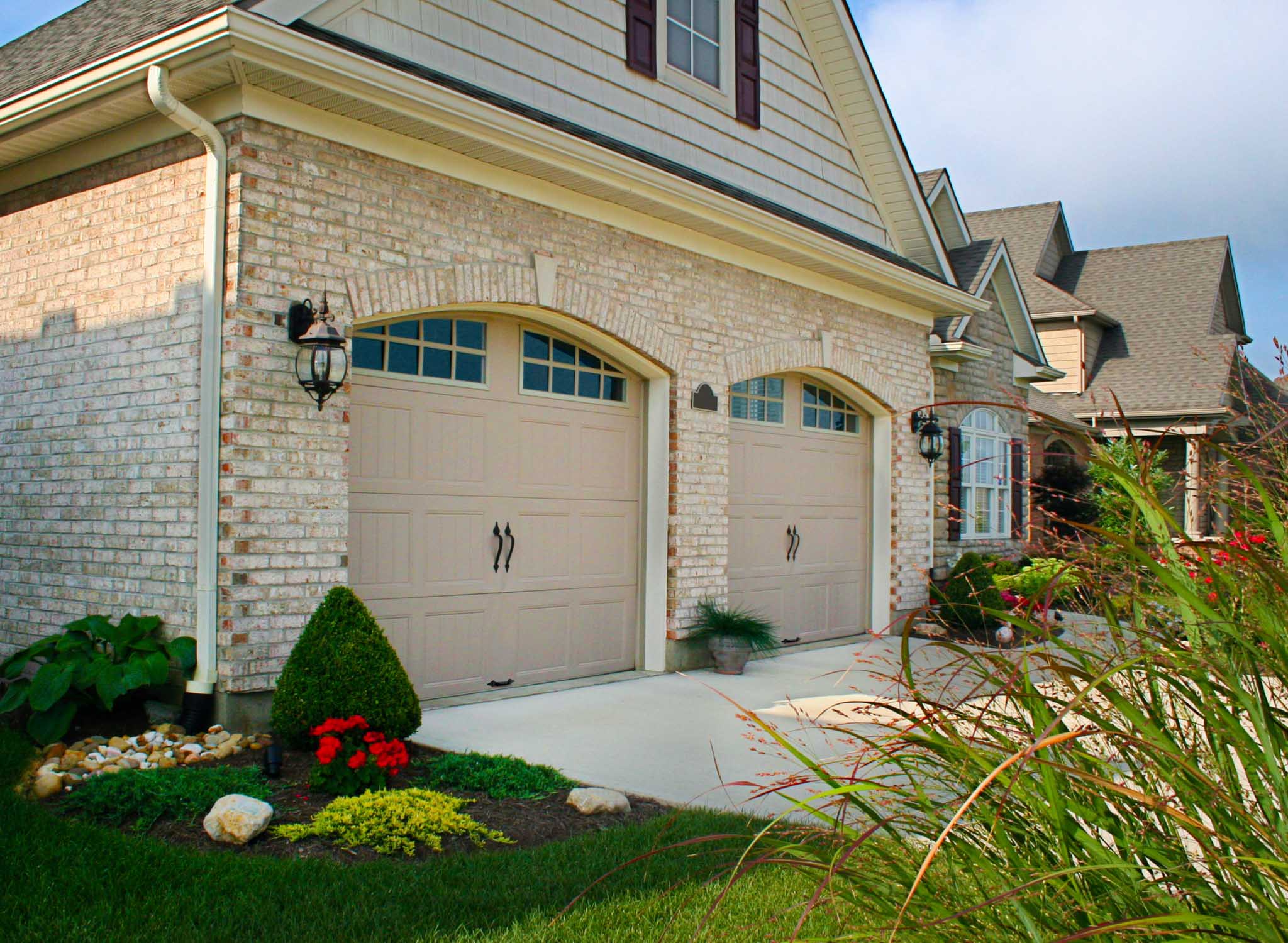 tan eyebrow steel 8x7 garage doors