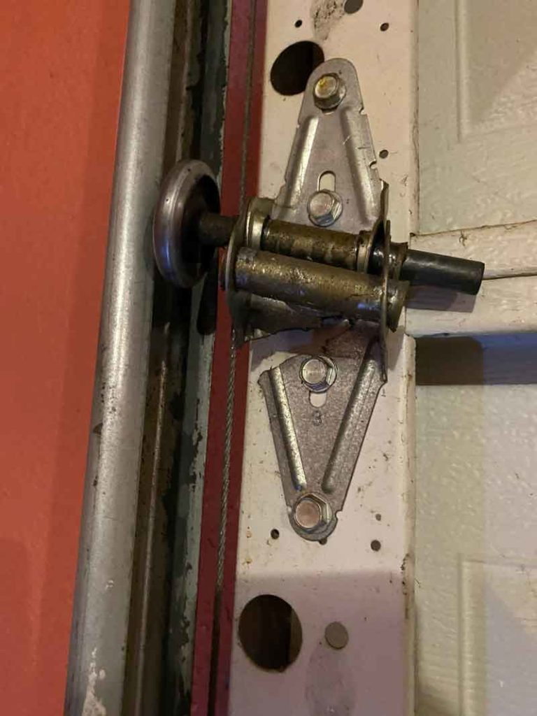 Broken Garage Door Hinge Replacement Near Me Doorvana