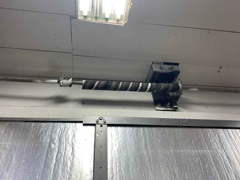 broken torsion garage spring