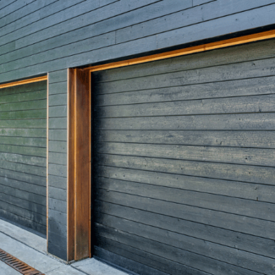 black shou sugi ban horizontal plank garage doors