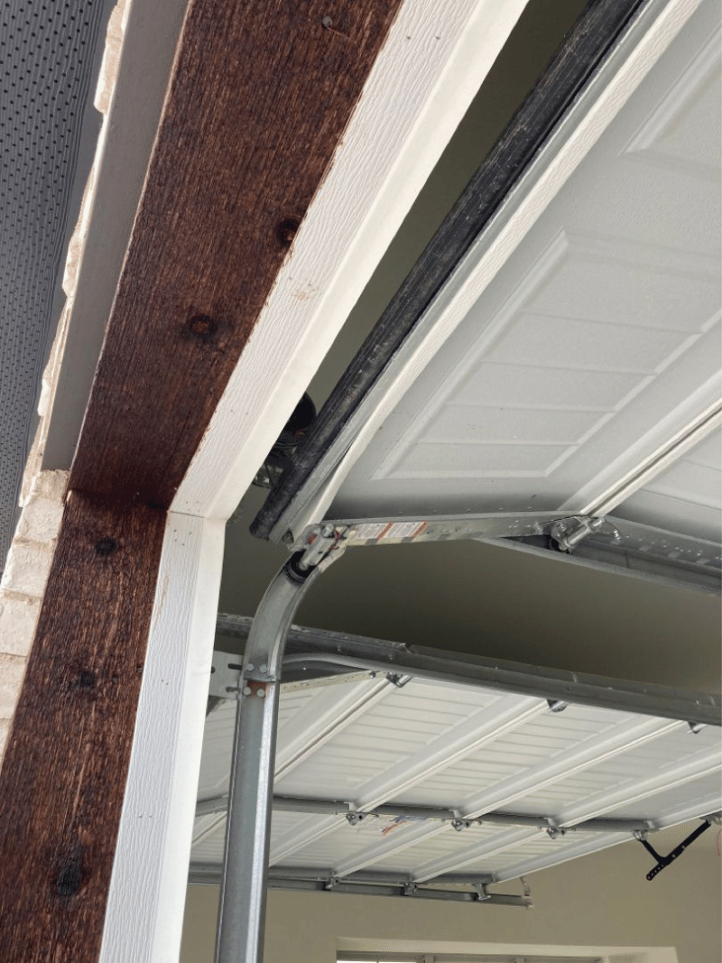 damaged bottom garage door section