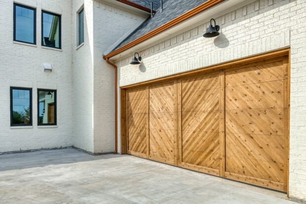 18x8 cedar chevron garage door with white brick and black windows